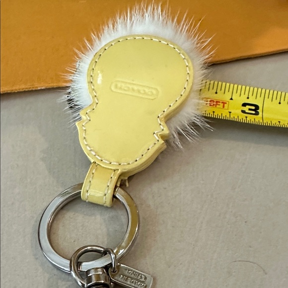 Coach Yellow and White Pom Pom Keychain - Picture 7 of 7